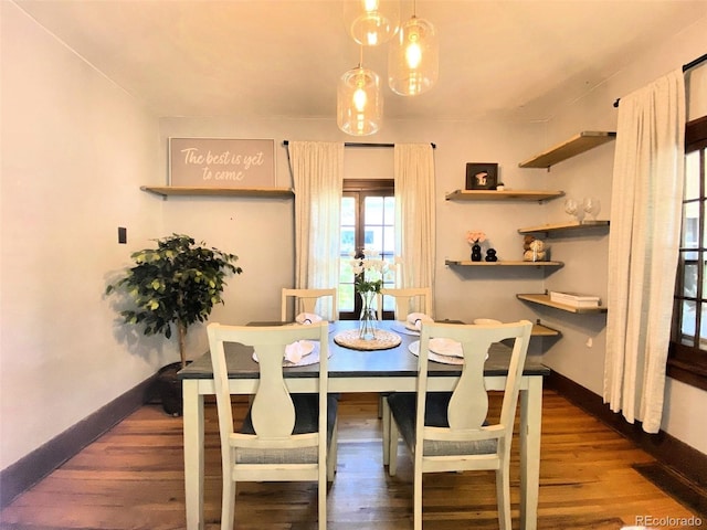 620 Walnut St, Windsor, CO 80550 - dining room with baseboards and wood finished floors
