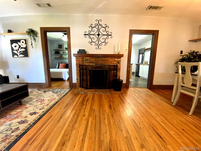 620 Walnut St, Windsor, CO 80550 - living area with wood finished floors and a fireplace