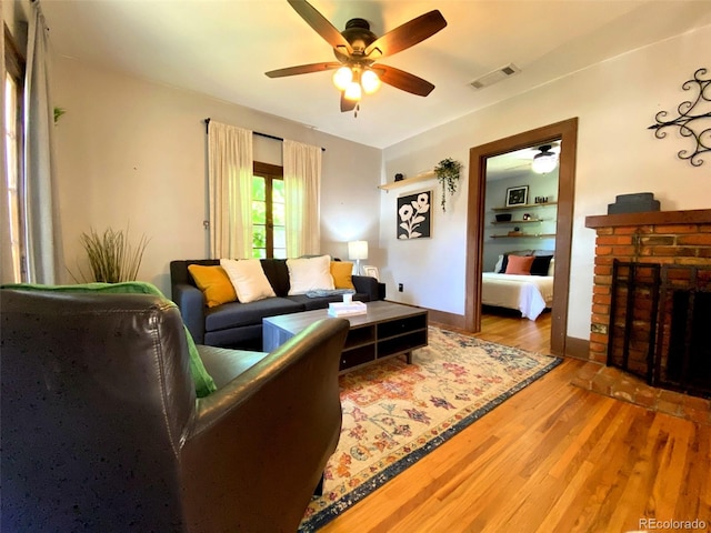 620 Walnut St, Windsor, CO 80550 - living room featuring wood finished floors and a ceiling fan