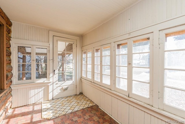 620 Walnut St, Windsor, CO 80550 - unfurnished sunroom with brick patterned flooring