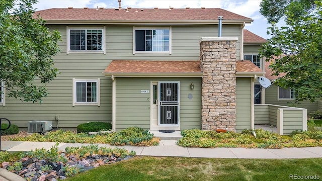 8406 Everett Way Unit C, Arvada, CO 80005 - view of front of home featuring roof with shingles