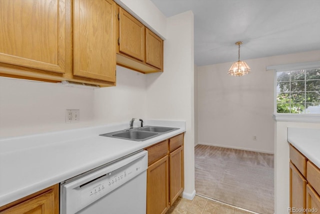 8406 Everett Way Unit C, Arvada, CO 80005 - kitchen featuring dishwasher, light countertops, decorative light fixtures, light carpet, and a chandelier