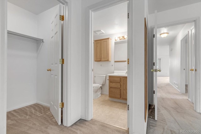 8406 Everett Way Unit C, Arvada, CO 80005 - hall with light colored carpet and baseboards