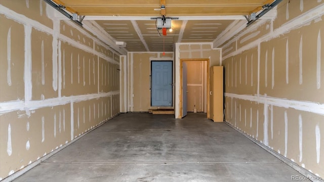 8406 Everett Way Unit C, Arvada, CO 80005 - garage featuring a garage door opener