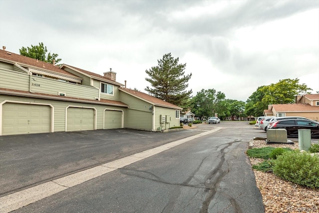 8406 Everett Way Unit C, Arvada, CO 80005 - view of asphalt road with community garages