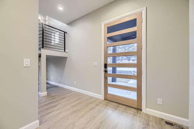 foyer featuring light wood-type flooring