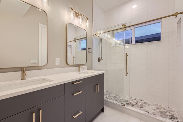 bathroom with vanity and an enclosed shower