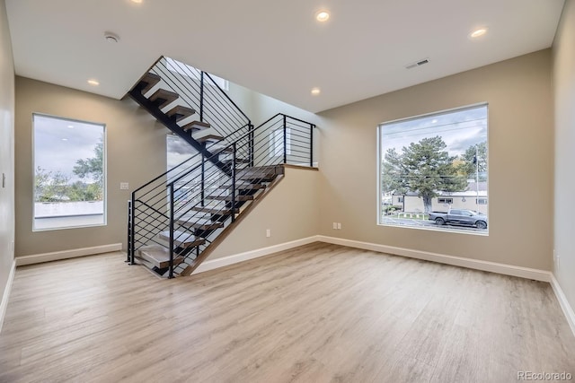 living room with light hardwood / wood-style floors