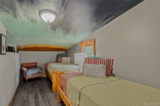 119 Yew Ln, Bailey, CO 80421 - bedroom featuring wood finished floors and vaulted ceiling