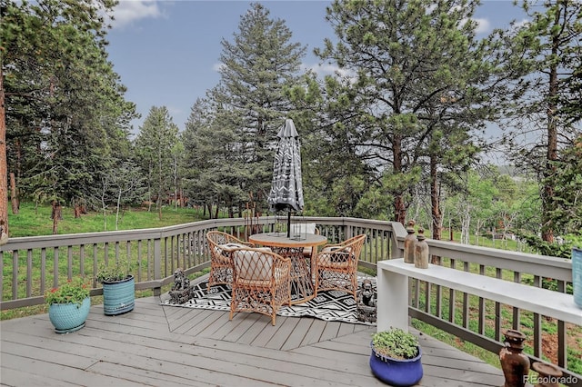 119 Yew Ln, Bailey, CO 80421 - wooden terrace with outdoor dining space