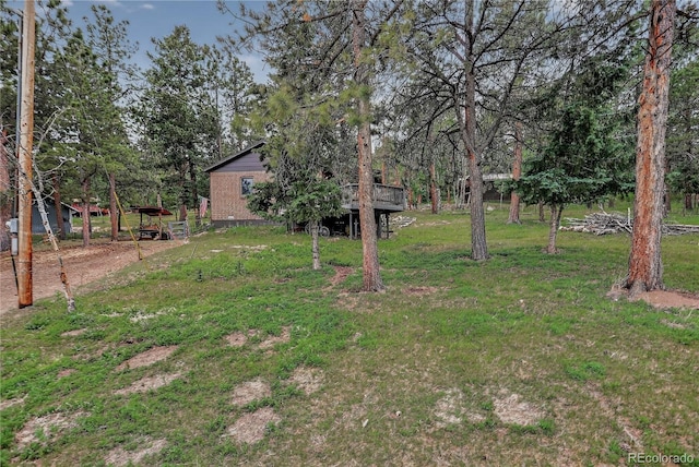 119 Yew Ln, Bailey, CO 80421 - view of grassy yard with a wooden deck