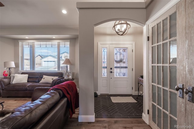 entrance foyer with wood finished floors and recessed lighting