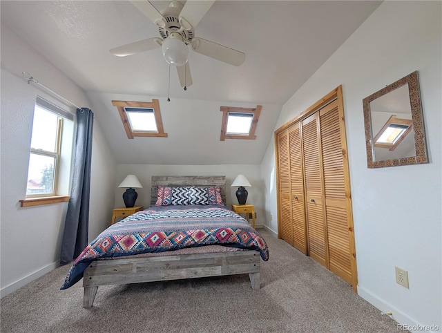240 Fourth St, Fairplay, CO 80440 - carpeted bedroom featuring a closet, a ceiling fan, vaulted ceiling, and baseboards
