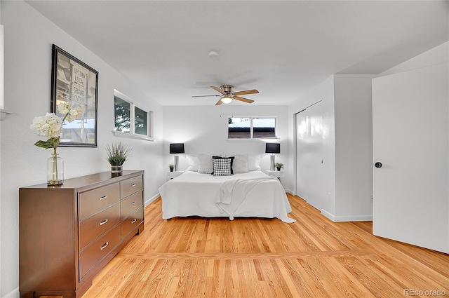 bedroom featuring ceiling fan and light hardwood / wood-style floors