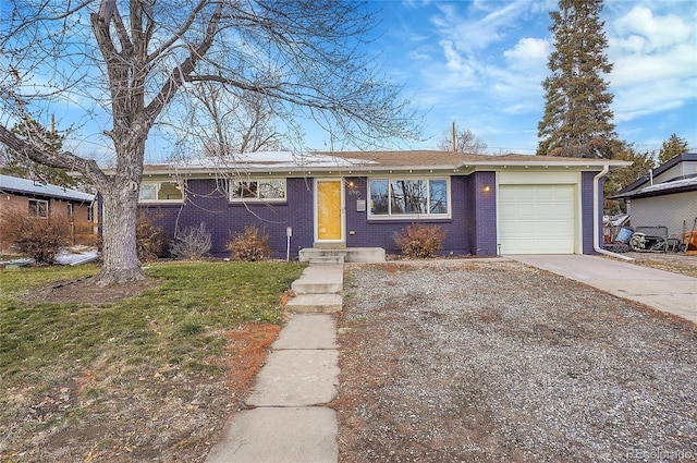 single story home featuring a garage