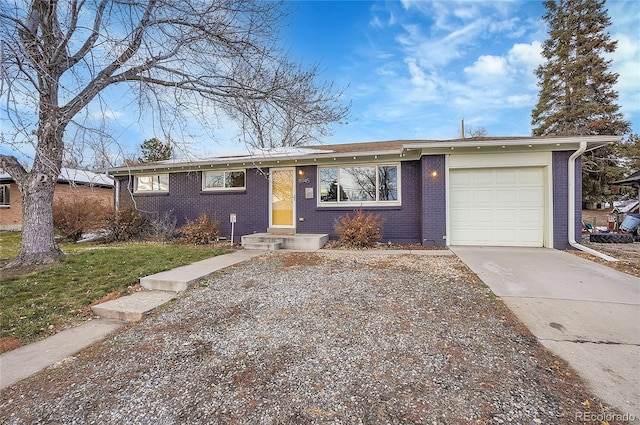 ranch-style home featuring a garage