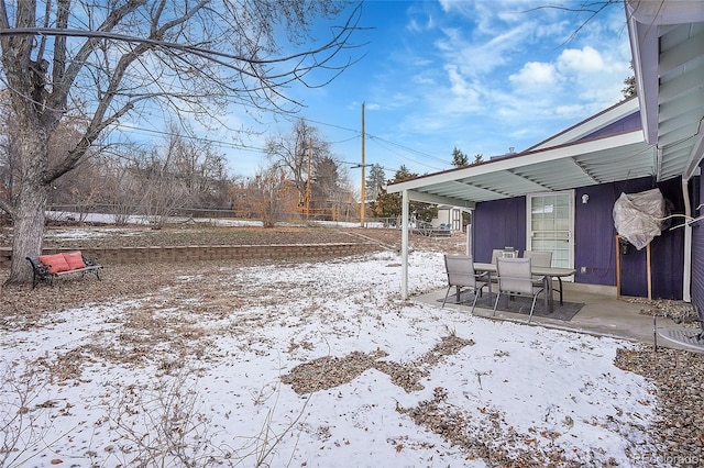 view of yard covered in snow