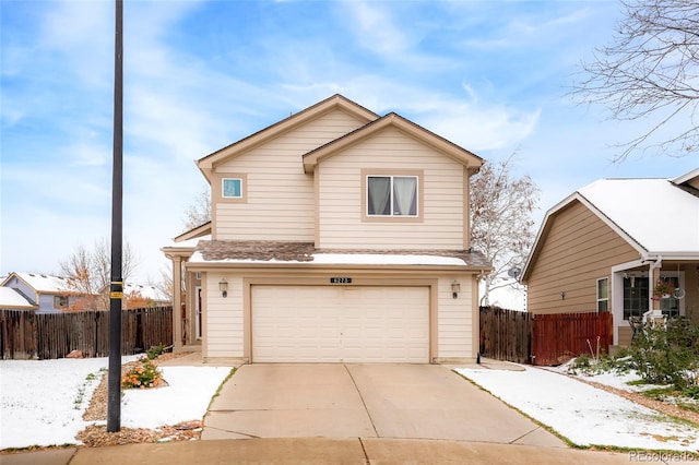 front of property with a garage