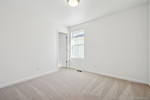 unfurnished room with carpet