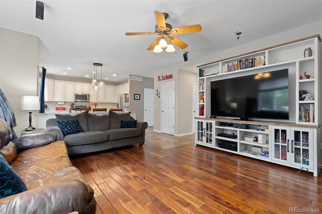 13753 Monroe St, Thornton, CO 80602 - living area featuring a ceiling fan, wood finished floors, and recessed lighting