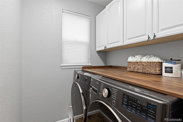 13753 Monroe St, Thornton, CO 80602 - laundry area with washer and clothes dryer, cabinet space, and a textured wall