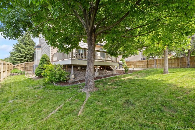 13753 Monroe St, Thornton, CO 80602 - fenced backyard featuring a wooden deck