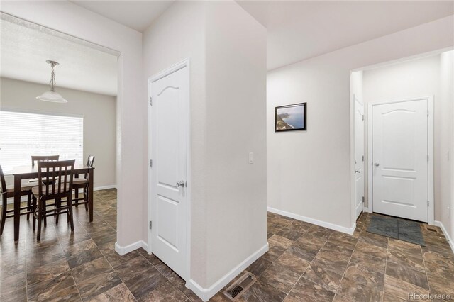 481 Vista Blvd, Brighton, CO 80603 - entrance foyer with baseboards and stone finish flooring