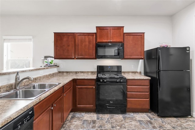 481 Vista Blvd, Brighton, CO 80603 - kitchen featuring black appliances, a sink, and light countertops