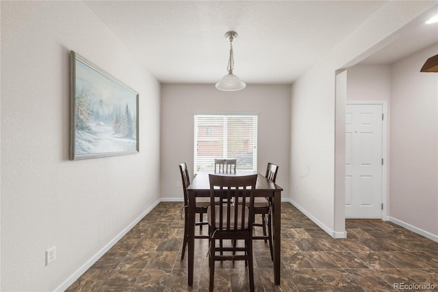 481 Vista Blvd, Brighton, CO 80603 - dining area featuring stone finish floors and baseboards