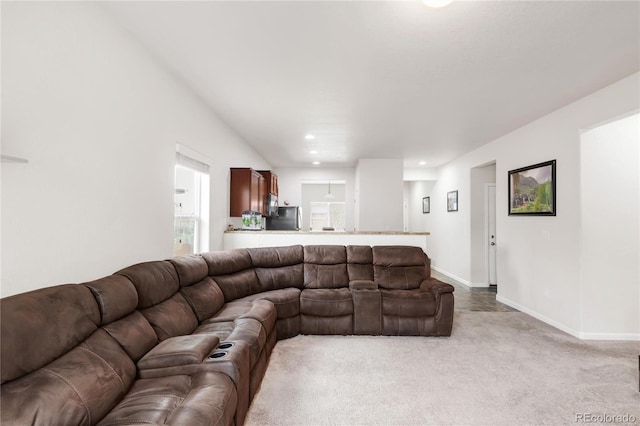 481 Vista Blvd, Brighton, CO 80603 - living area featuring light carpet, recessed lighting, and baseboards