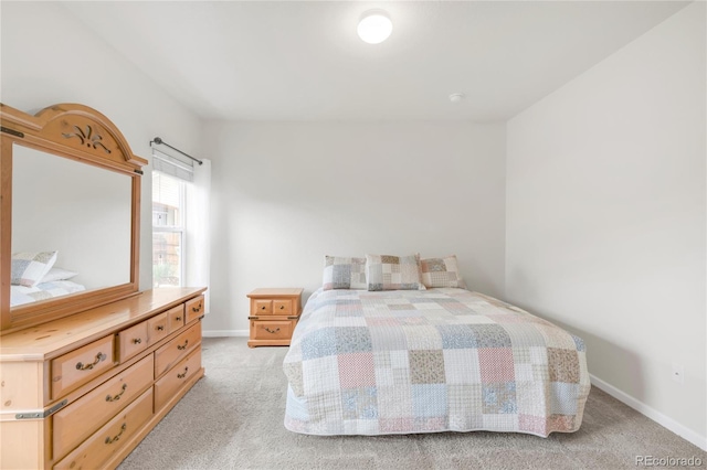 481 Vista Blvd, Brighton, CO 80603 - bedroom with light colored carpet and baseboards