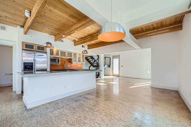 kitchen featuring wood ceiling, baseboards, stainless steel appliances, and beam ceiling