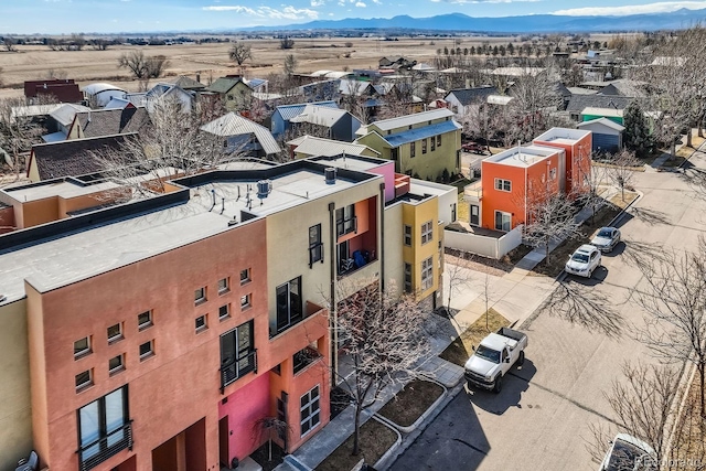 birds eye view of property featuring a residential view and a mountain view