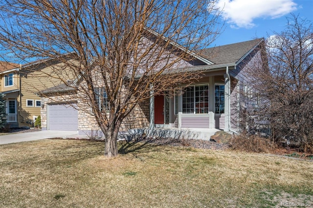 view of front facade featuring concrete driveway, a front lawn, and roof with shingles