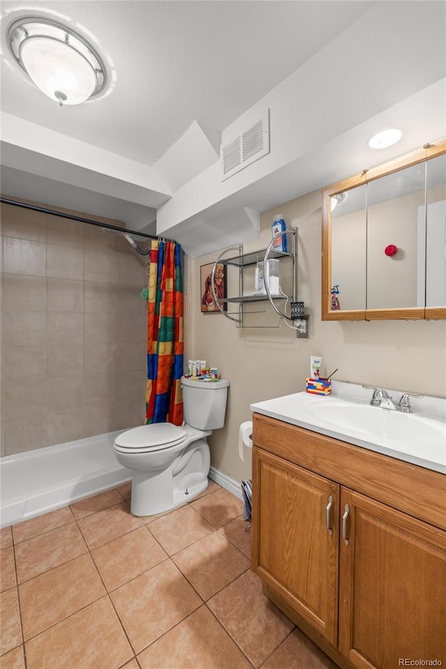 bathroom featuring walk in shower, tile patterned flooring, vanity, and toilet