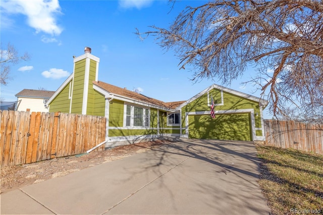 single story home featuring a garage