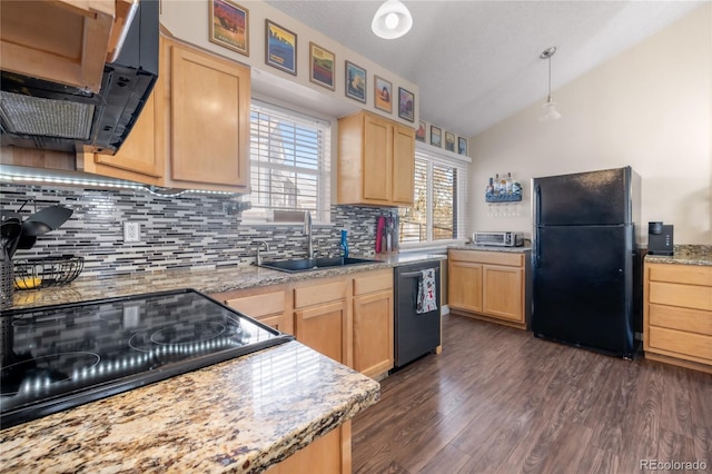 kitchen featuring light brown cabinets, backsplash, black appliances, sink, and vaulted ceiling