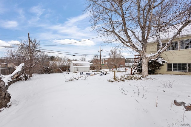 view of yard covered in snow