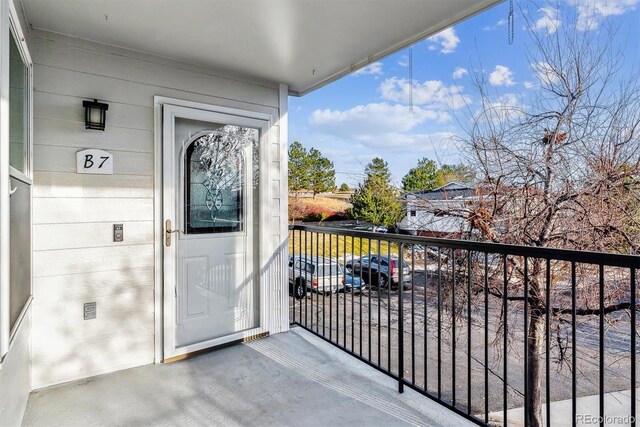 1648 S Cole St Unit B7, Lakewood, CO 80228 - doorway to property with a balcony