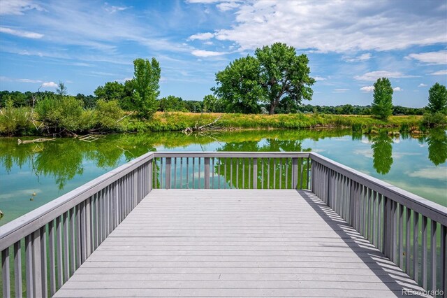 1648 S Cole St Unit B7, Lakewood, CO 80228 - wooden deck featuring a water view