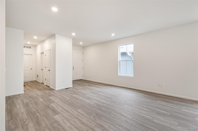 empty room featuring light hardwood / wood-style flooring