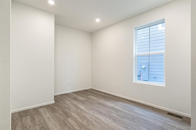 empty room featuring light hardwood / wood-style floors