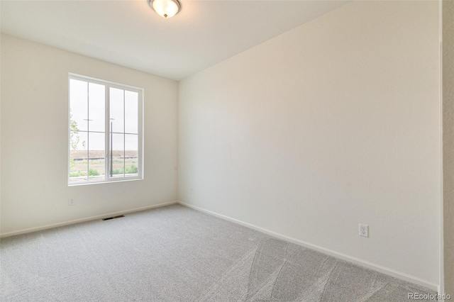 view of carpeted spare room