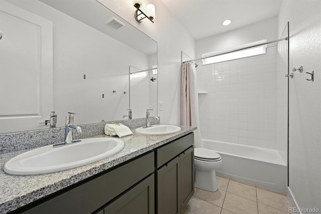 21440 E 61st Dr, Aurora, CO 80019 - full bathroom featuring toilet, tile patterned flooring, shower / bath combination with curtain, and double vanity