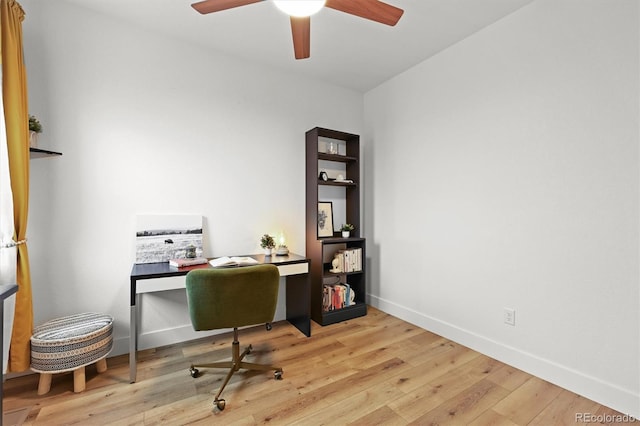 21440 E 61st Dr, Aurora, CO 80019 - office area featuring a ceiling fan, wood finished floors, and baseboards
