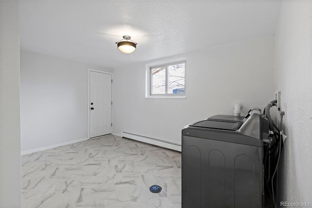 10801 W 29th Ave, Lakewood, CO 80215 - laundry area with laundry area, a textured ceiling, marble finish floor, a baseboard heating unit, and washing machine and dryer