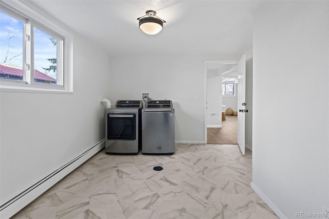 10801 W 29th Ave, Lakewood, CO 80215 - clothes washing area featuring laundry area, marble finish floor, washing machine and dryer, baseboards, and baseboard heating