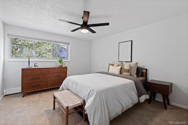 10801 W 29th Ave, Lakewood, CO 80215 - bedroom featuring baseboards, a baseboard radiator, light carpet, and a ceiling fan