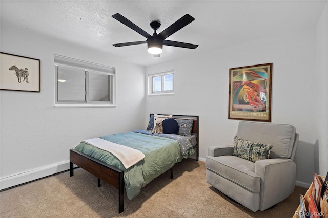 10801 W 29th Ave, Lakewood, CO 80215 - bedroom featuring carpet floors, a ceiling fan, and baseboards
