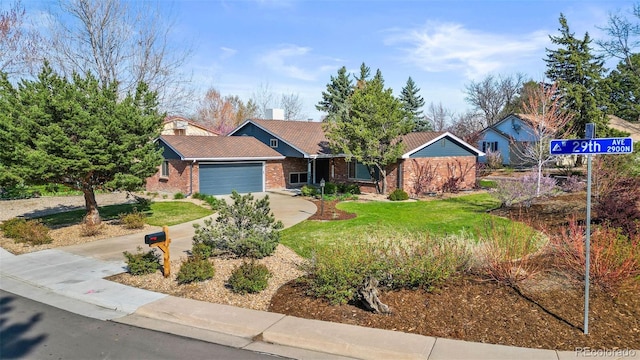 10801 W 29th Ave, Lakewood, CO 80215 - single story home featuring brick siding, concrete driveway, a garage, and a front yard